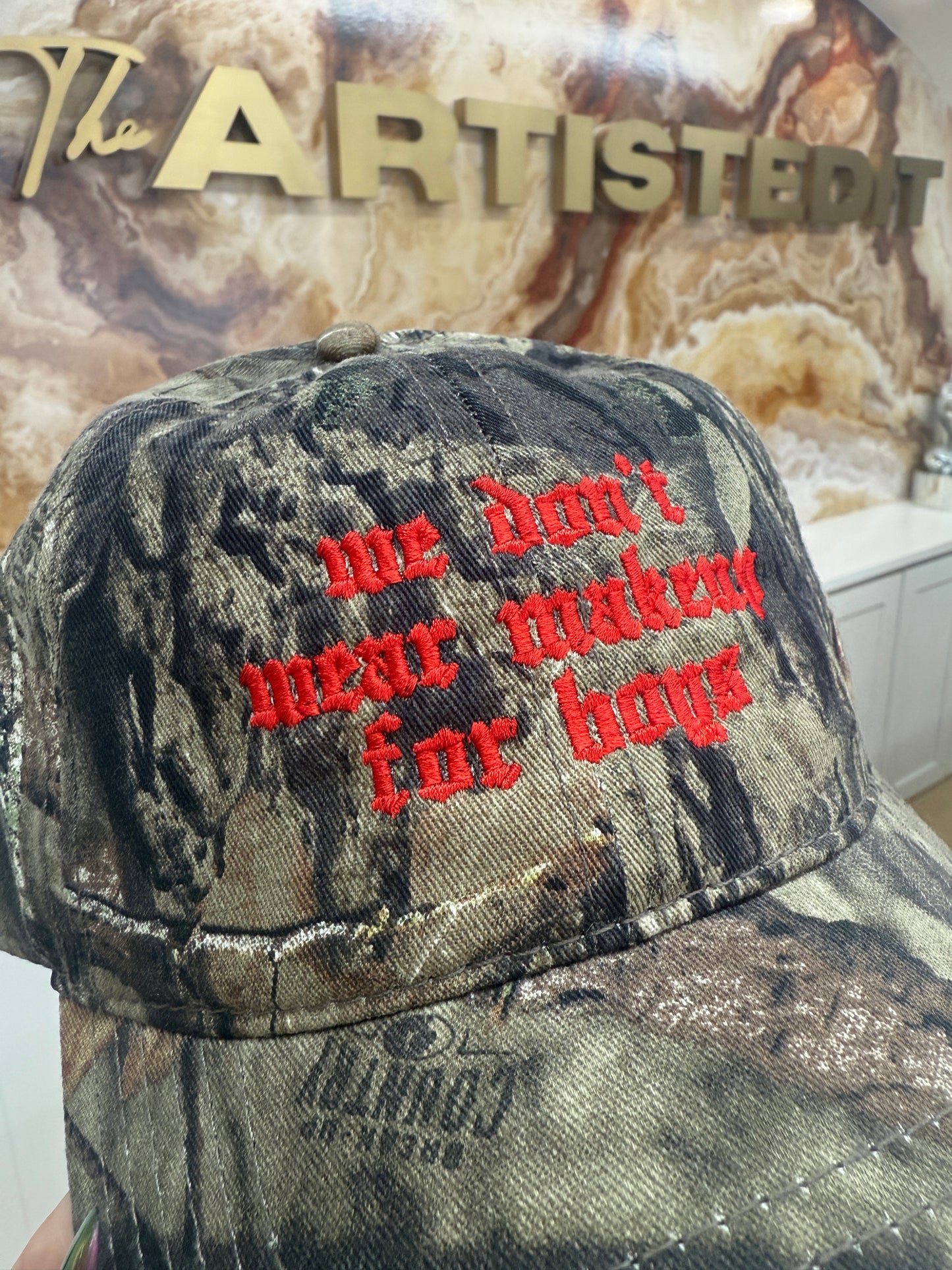 “we don’t wear makeup for boys” hat