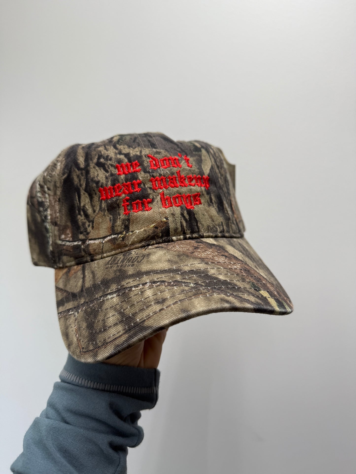 “we don’t wear makeup for boys” hat