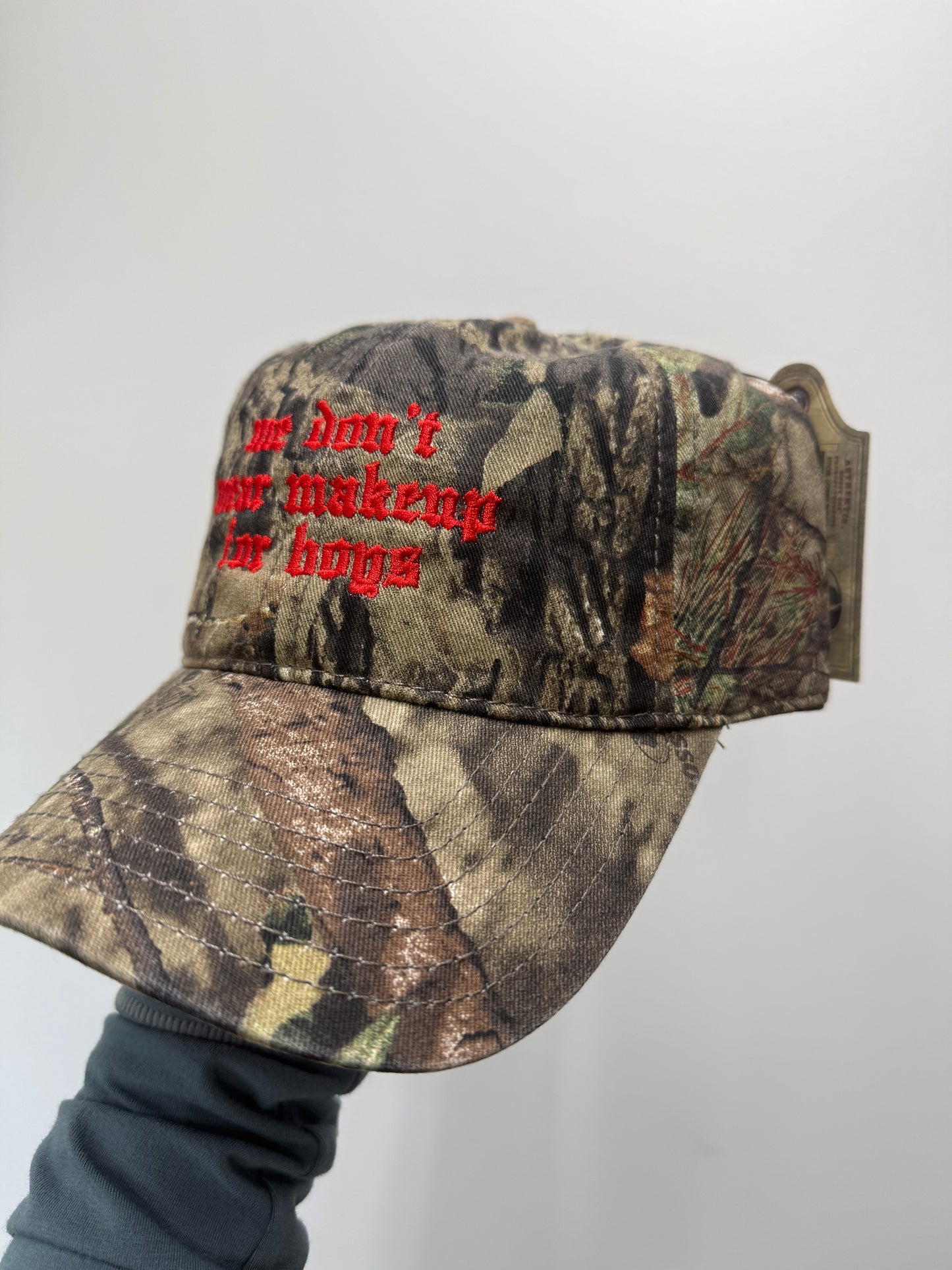 “we don’t wear makeup for boys” hat